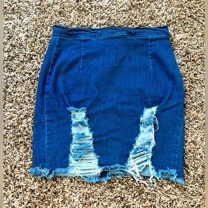 Blue denim distressed skirt